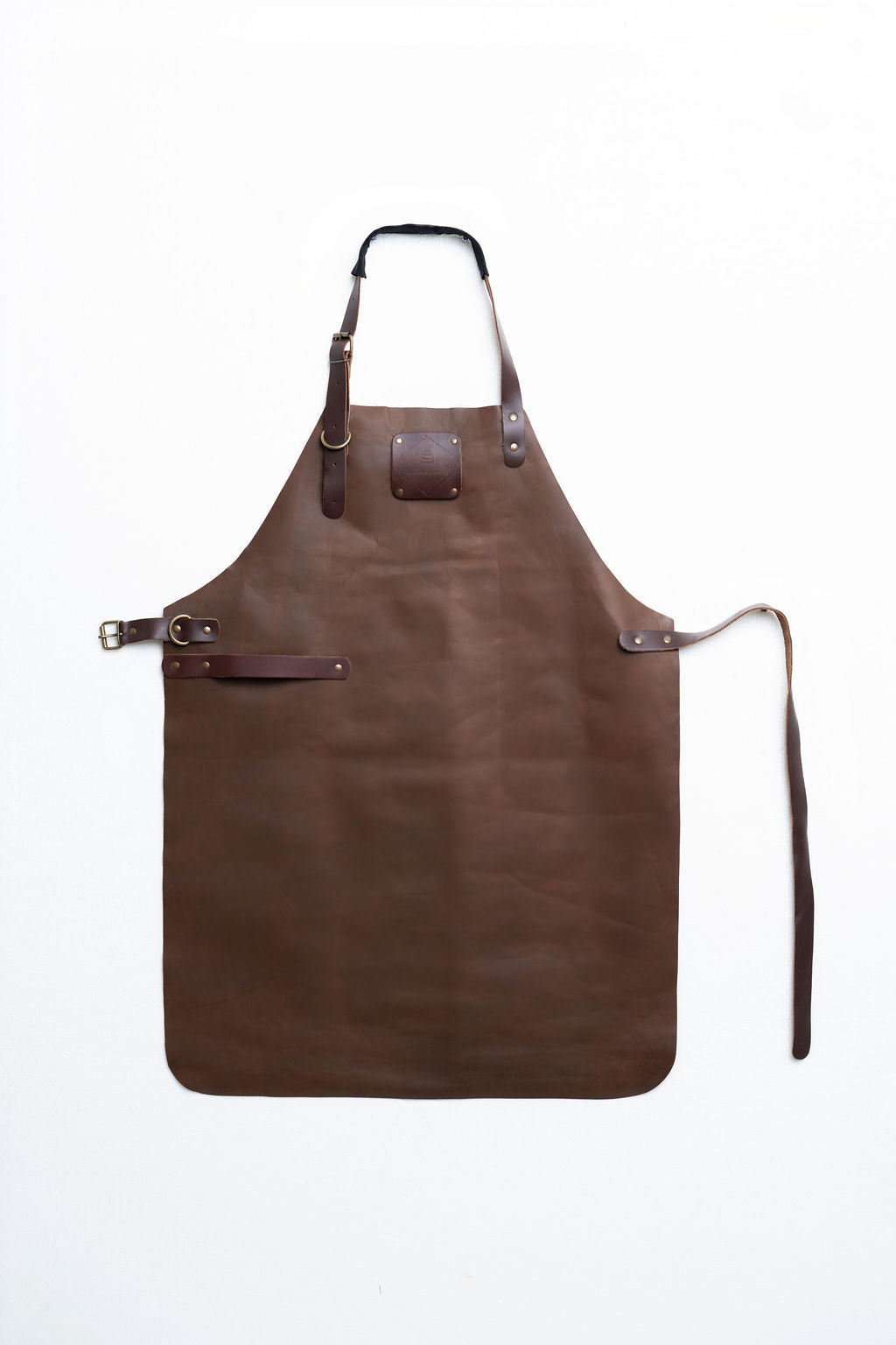 Adjustable strap brown leather apron for woodworking and crafting