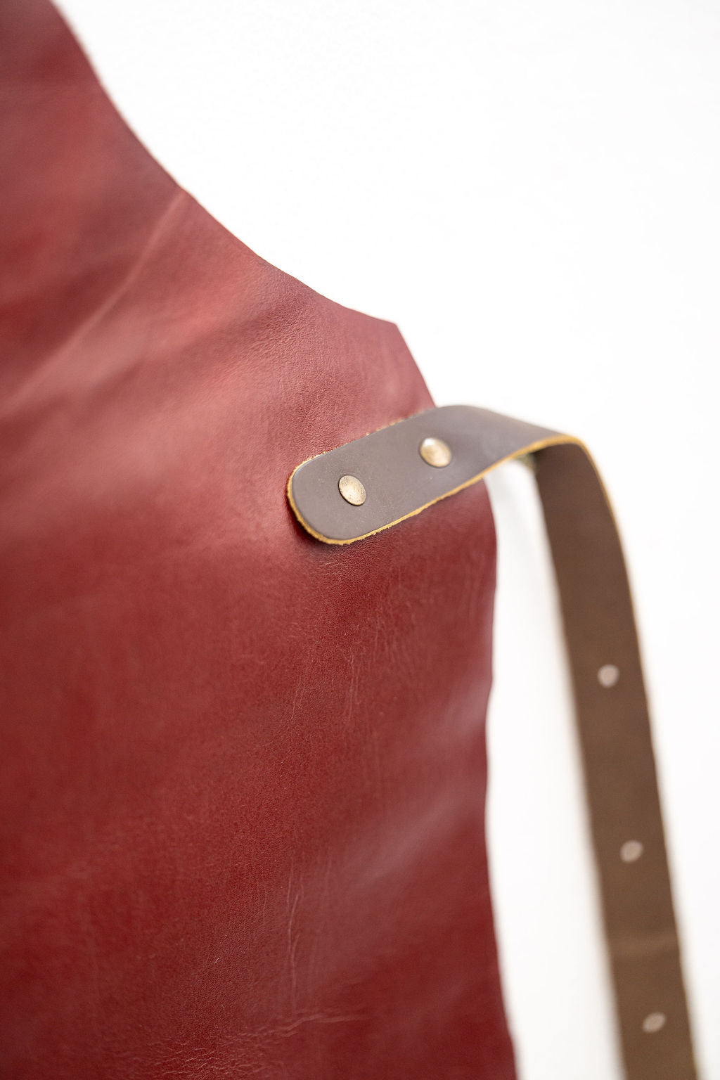 Premium red leather apron with smooth finish for barbers and makers