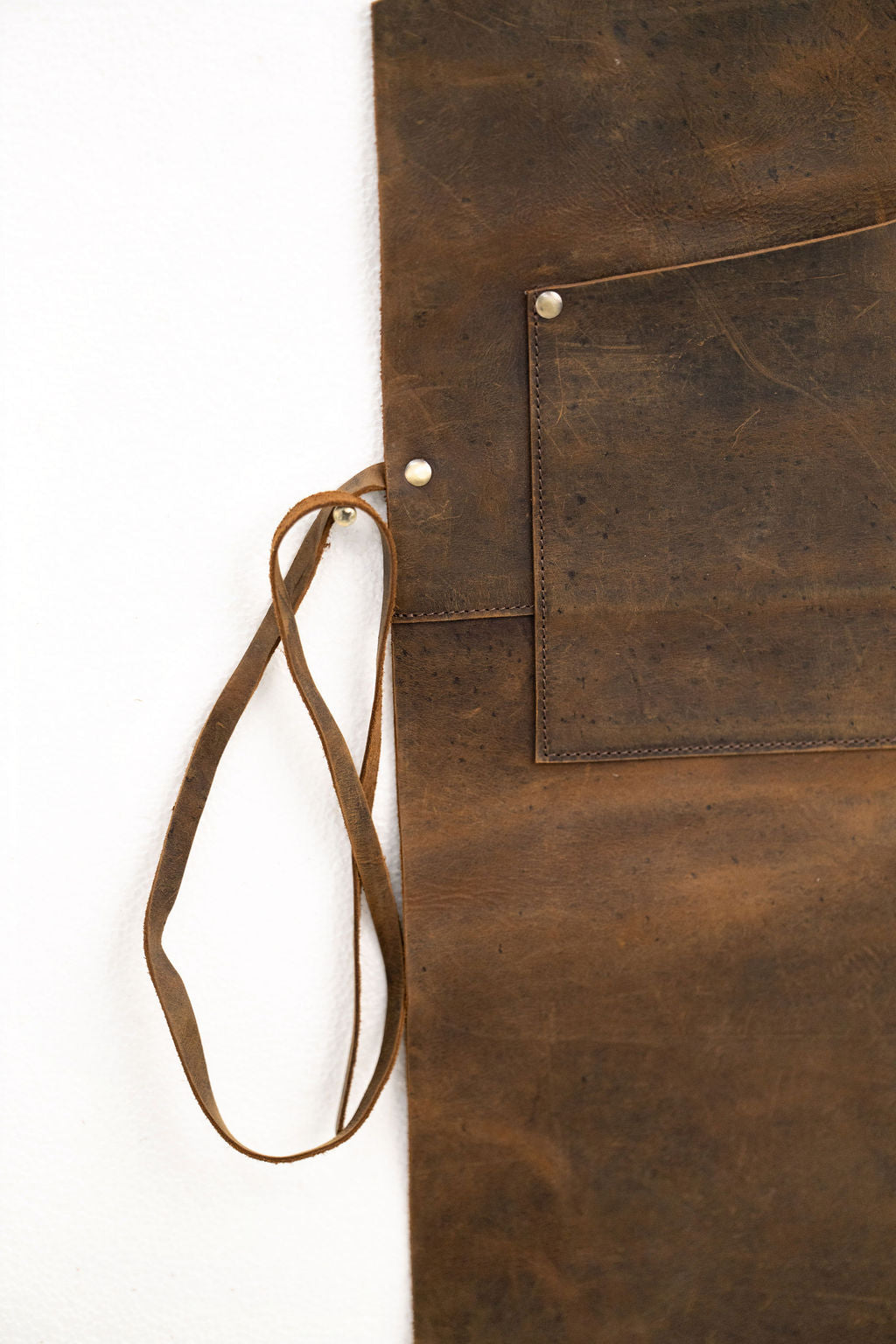 Professional brown leather apron with pockets for chefs and craftsmen