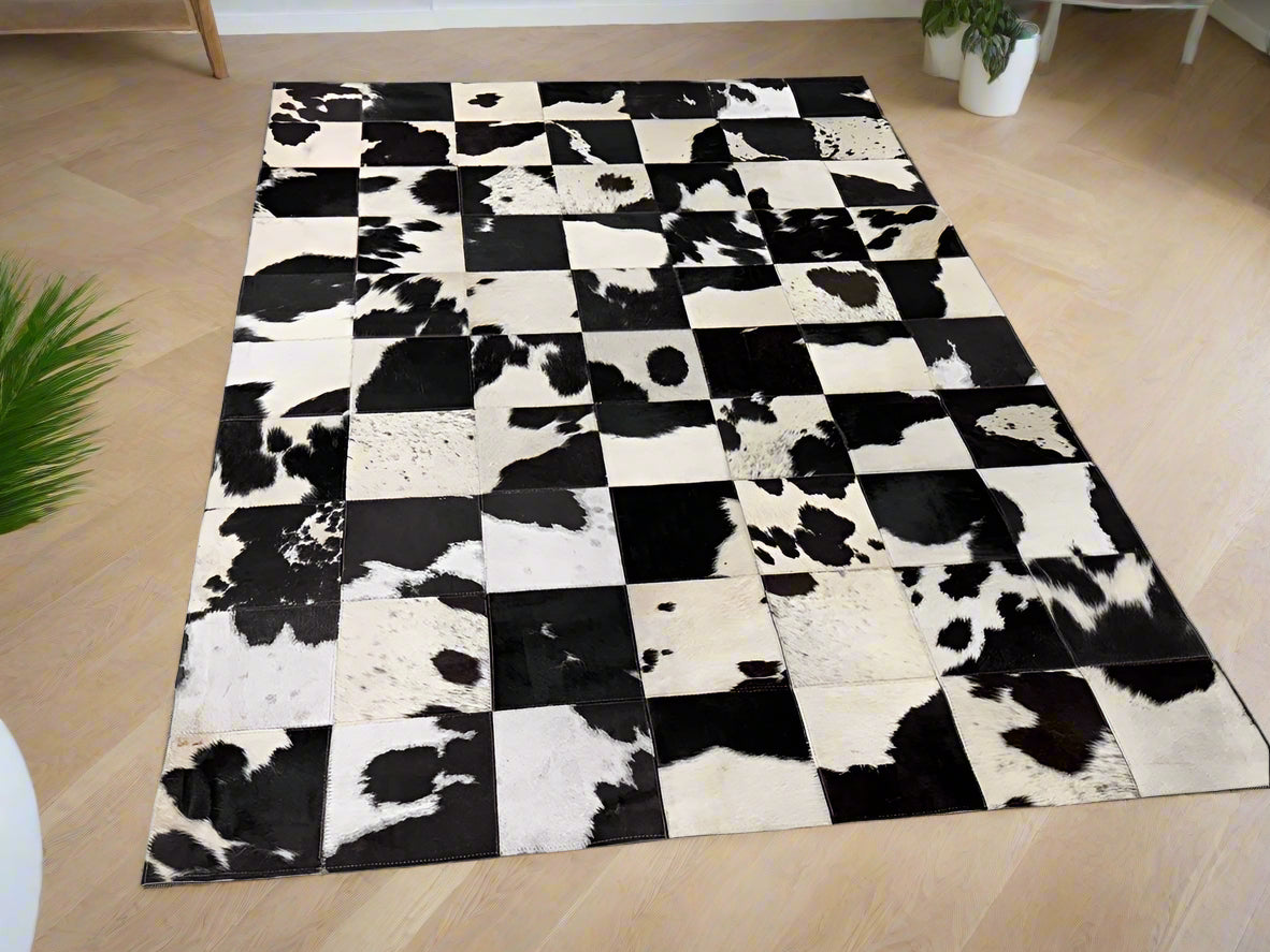 Checkerboard Cowhide Patchwork Rug – Handcrafted Natural Leather