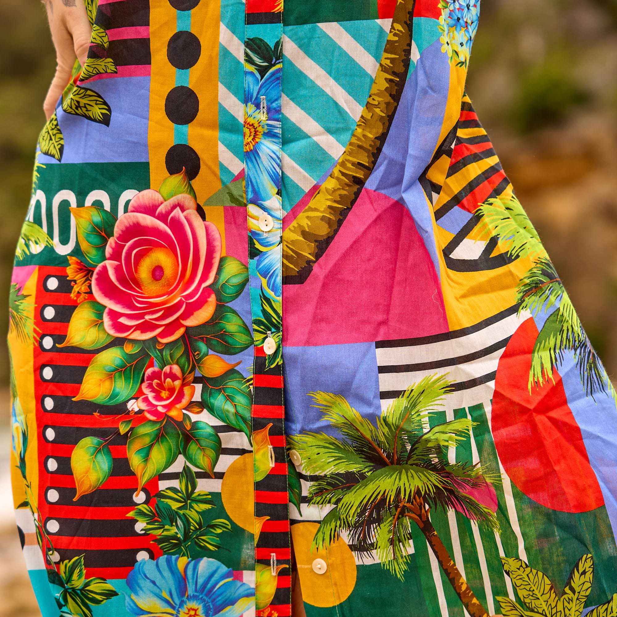 Lightweight tropical cotton maxi shirt dress with a flowing silhouette for effortless beachwear and resort style.