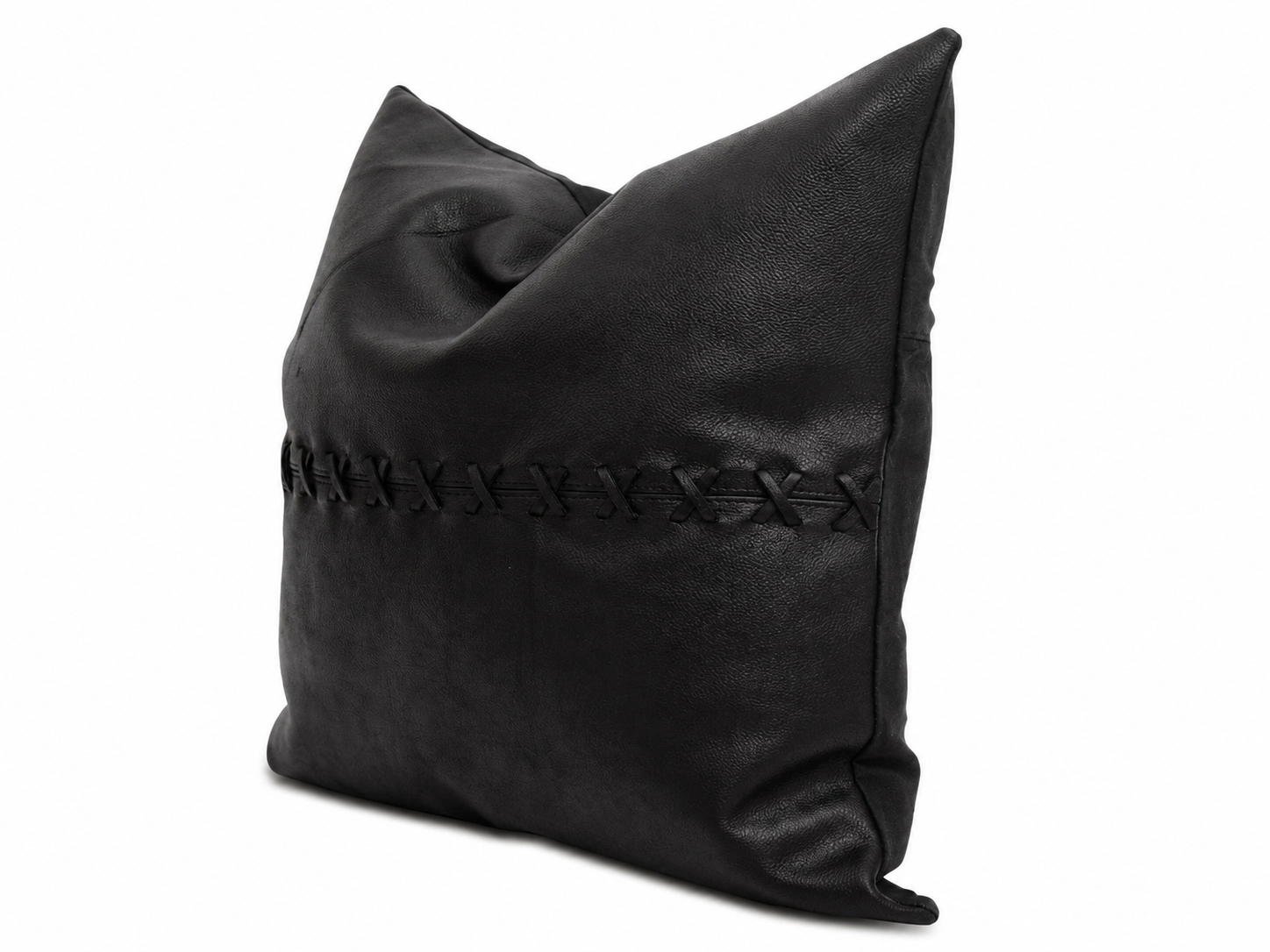 Premium tan leather cushion cover featuring black crosses, perfect for stylish living room interiors.
