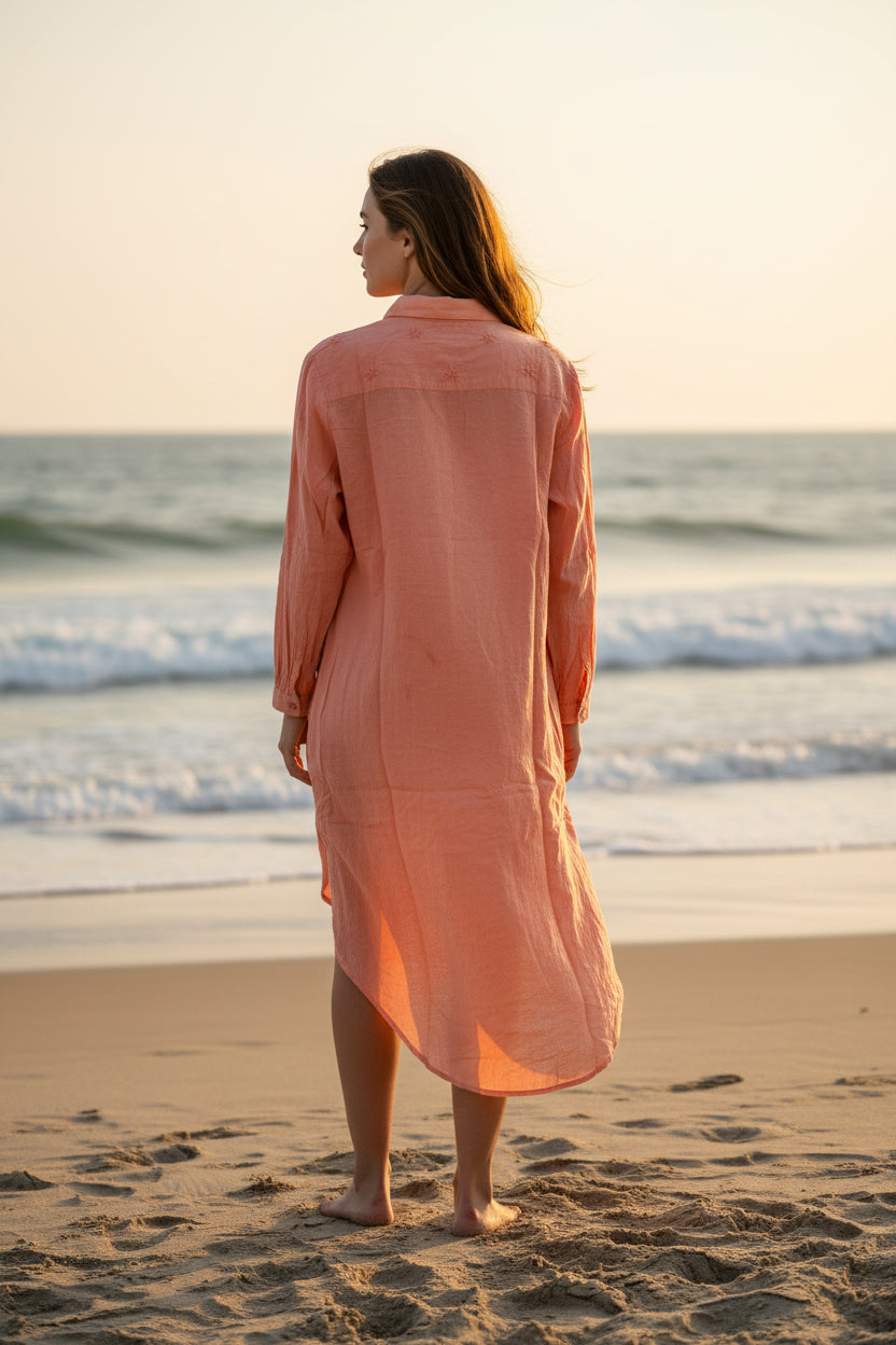 Boho cotton shirt dress in peach with embroidered detailing, side view