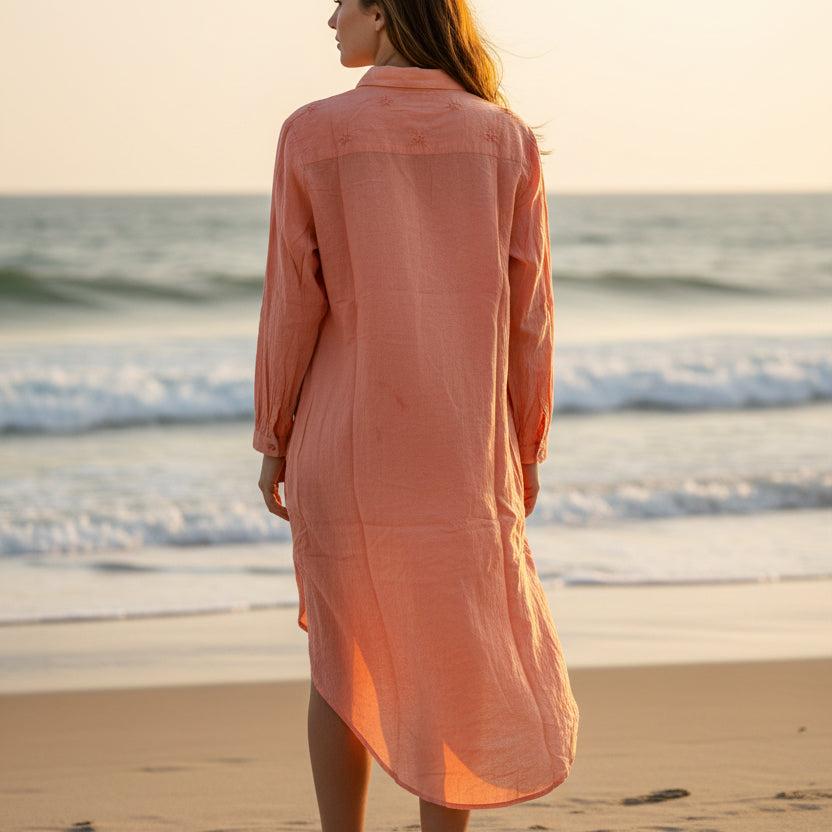 Boho cotton shirt dress in peach with embroidered detailing, side view