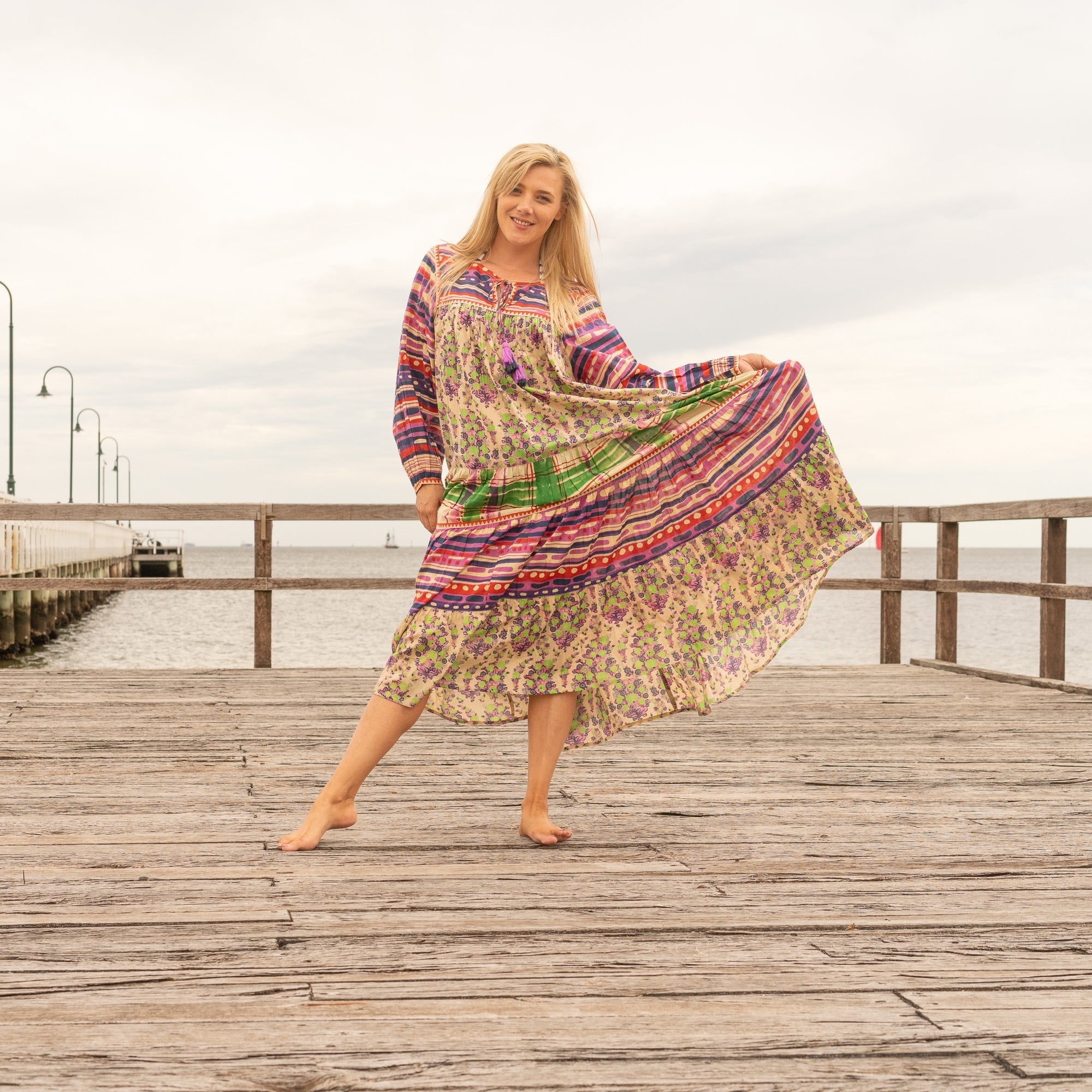 Elegant boho luxe floral patchwork maxi dress in vibrant multicolor tones