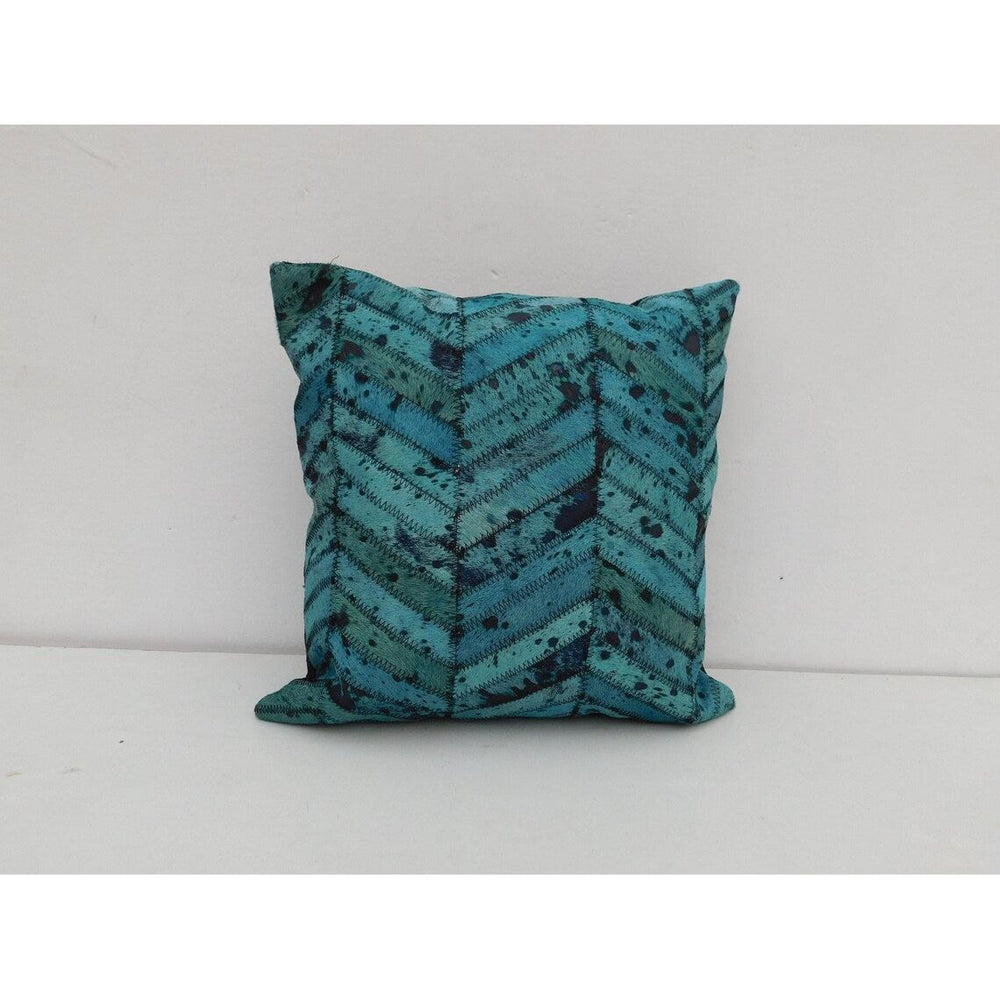 Teal hide and patchwork leather pillow cover with rich boho texture