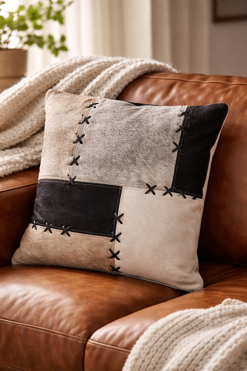 Boho eclectic cowhide patchwork pillow cover 45x45 featuring black and cream leather panels