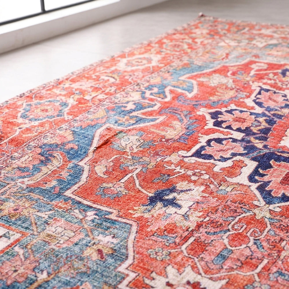 Soft vintage-inspired Persian medallion rug with distressed finish for home décor