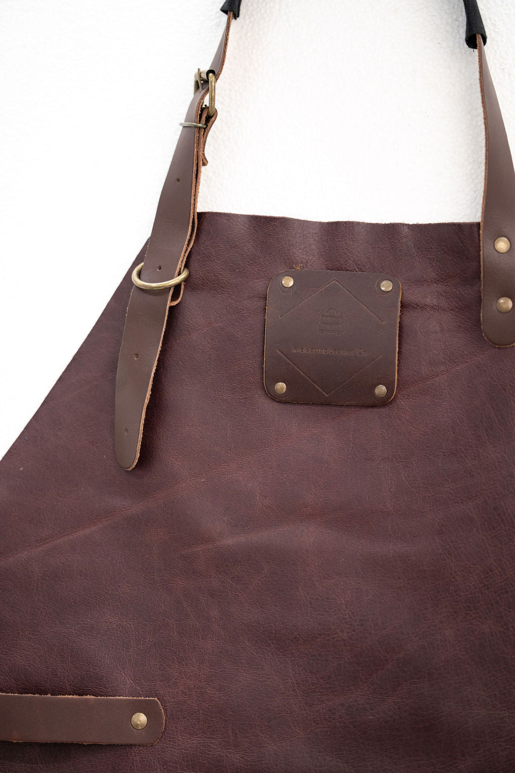 Durable espresso brown leather work apron for woodworking and workshop