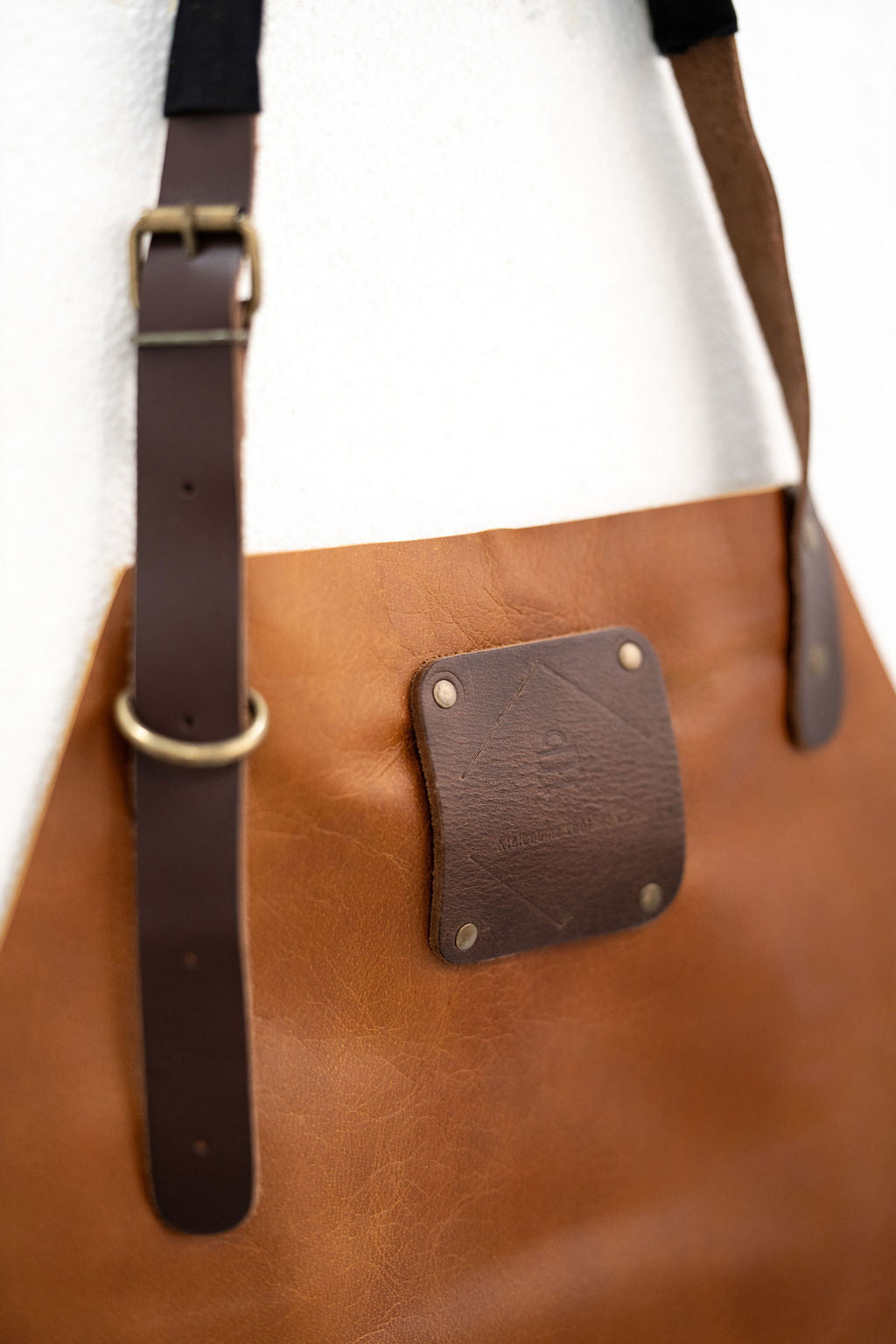 Professional saddle brown leather apron for barbers and makers