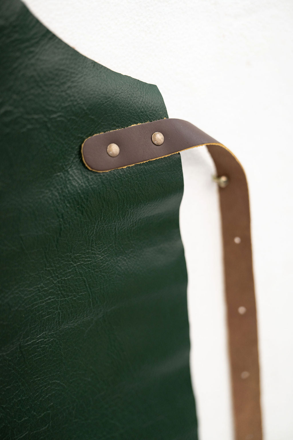 High quality forest green leather apron with strong stitching detail