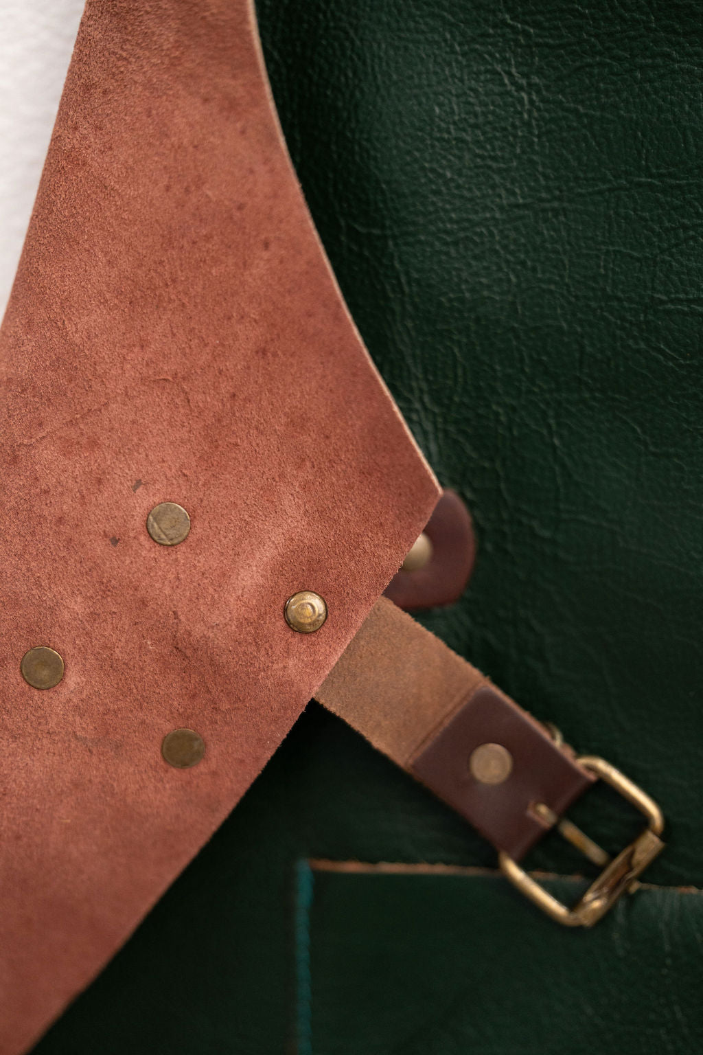 Premium green leather apron forest tone for creative workspaces