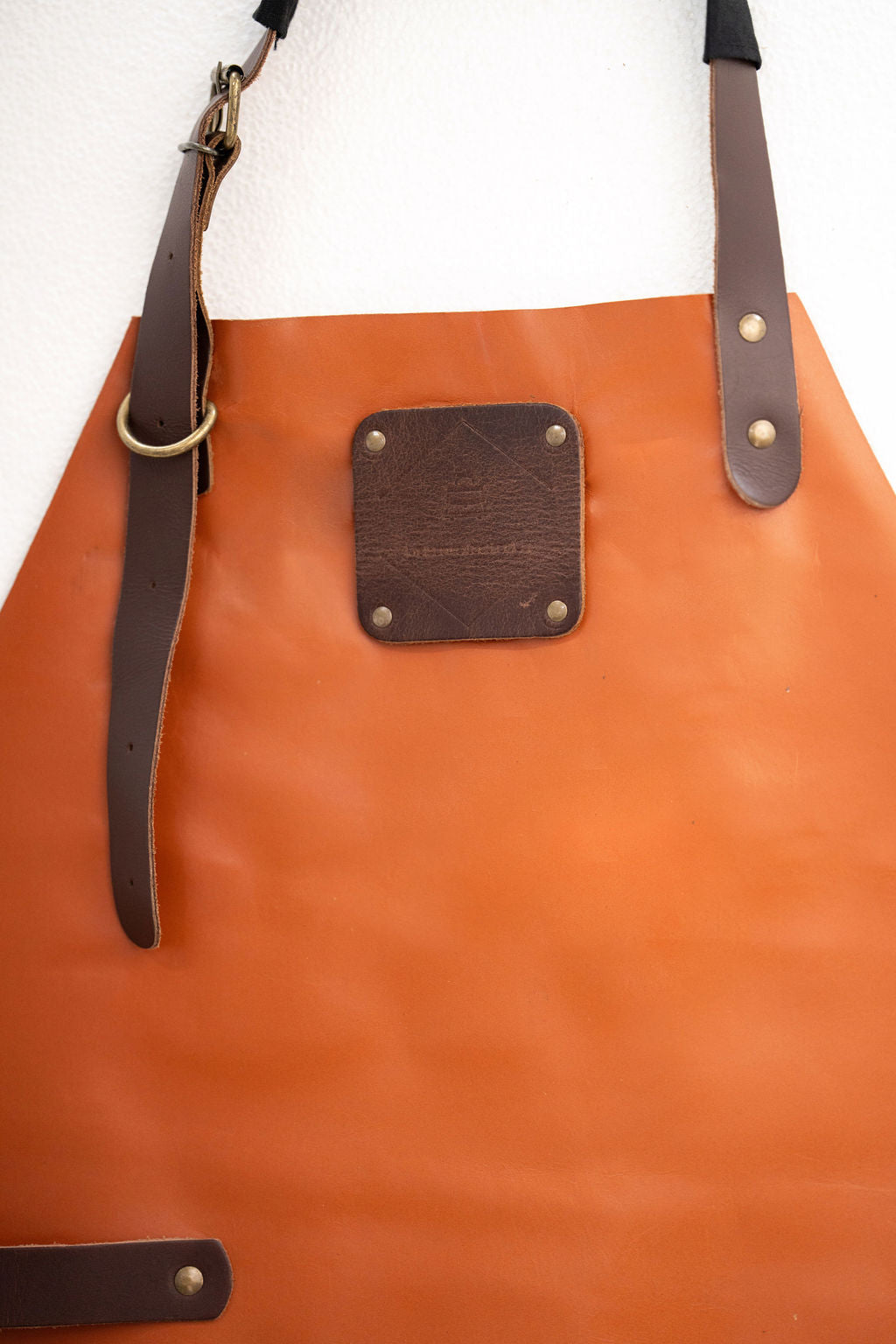 Full coverage cognac leather apron for chefs and craftsmen