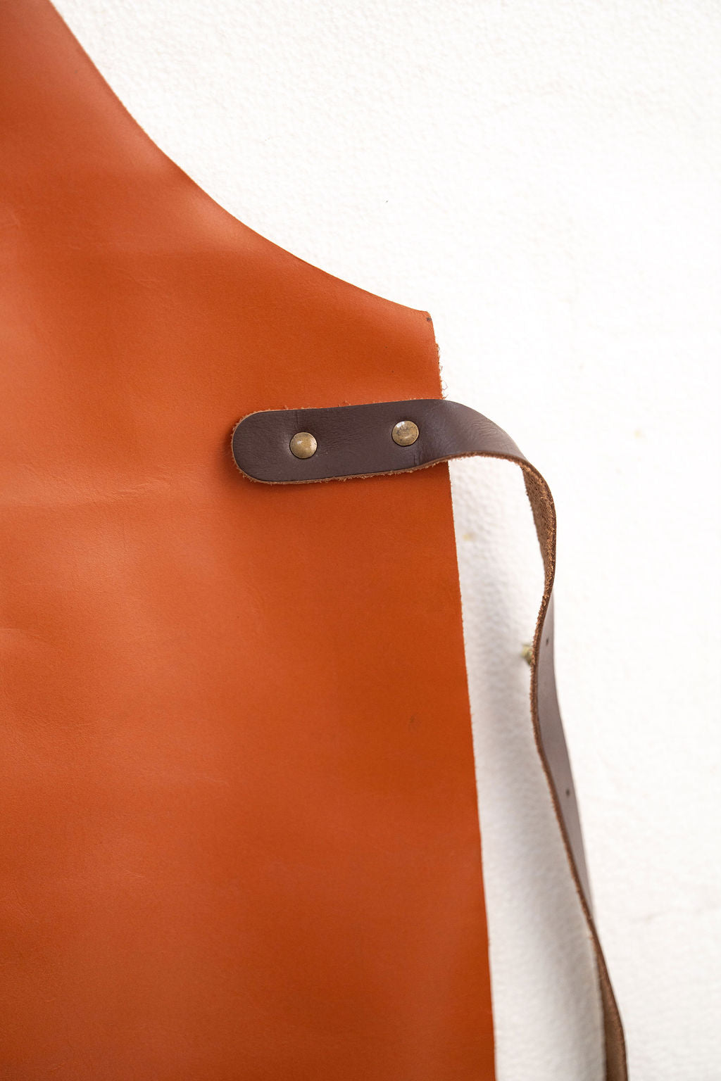 Stylish signature cognac tan leather apron for creative work