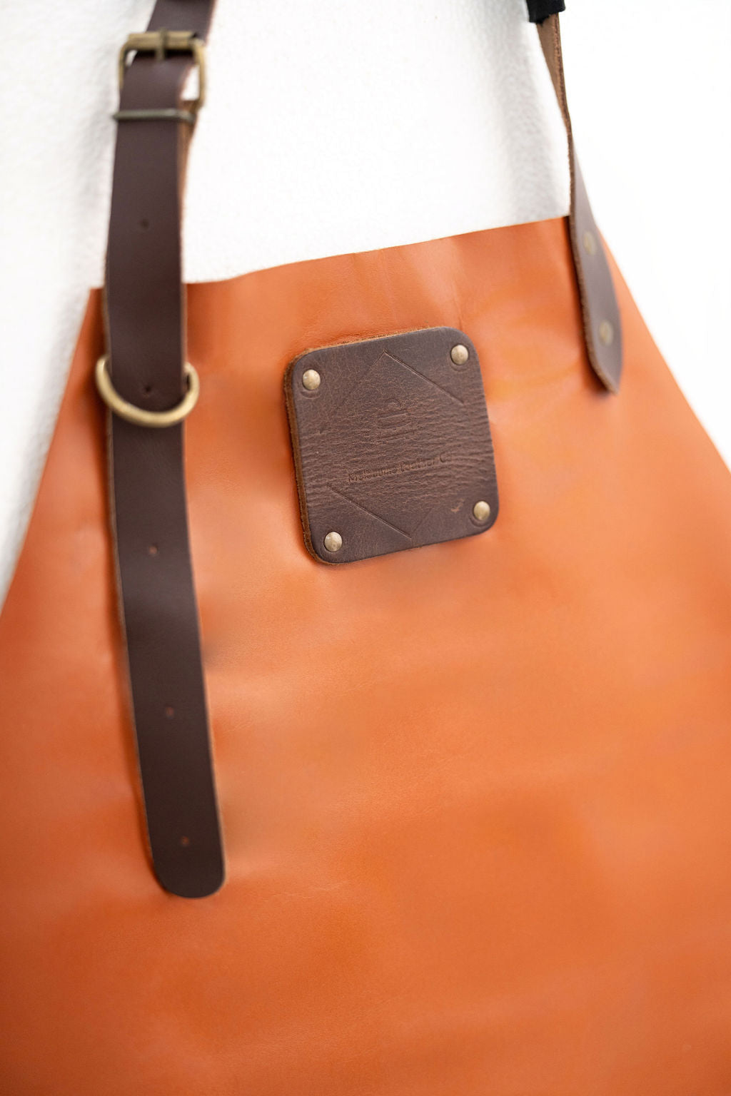 High quality cognac leather apron with strong stitching and durability