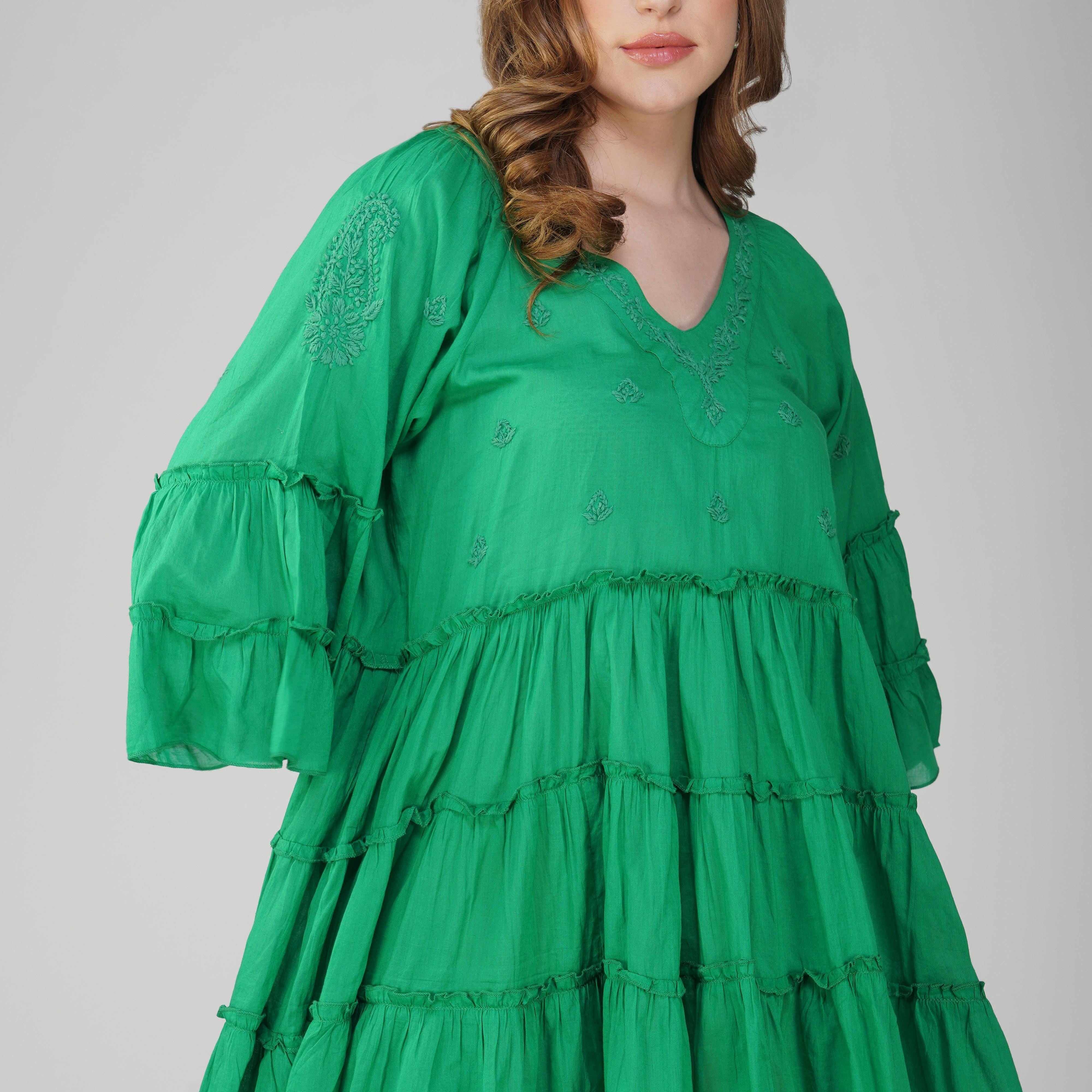 Back view of Tropical Twirl emerald green cotton mini dress with relaxed fit