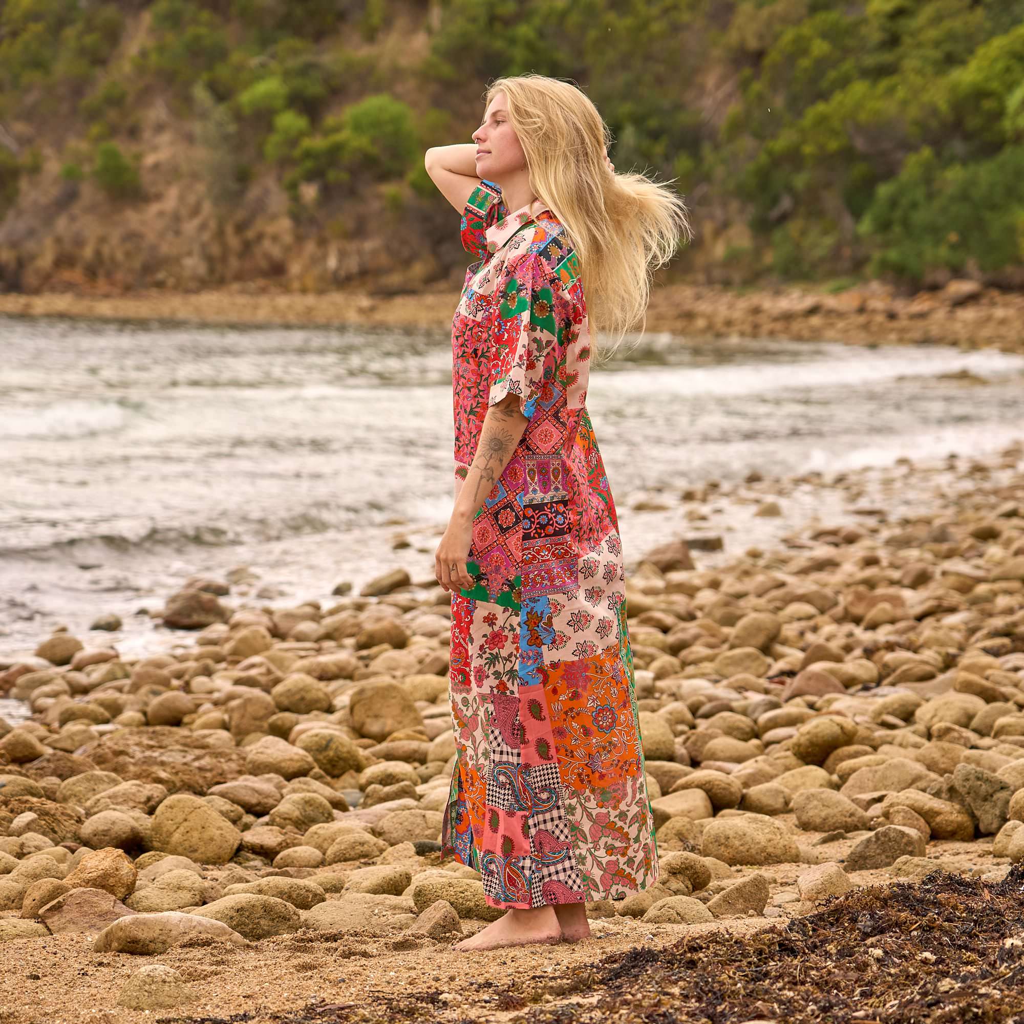 Boho patchwork shirt maxi dress featuring colorful artistic patterns for a stylish statement look.