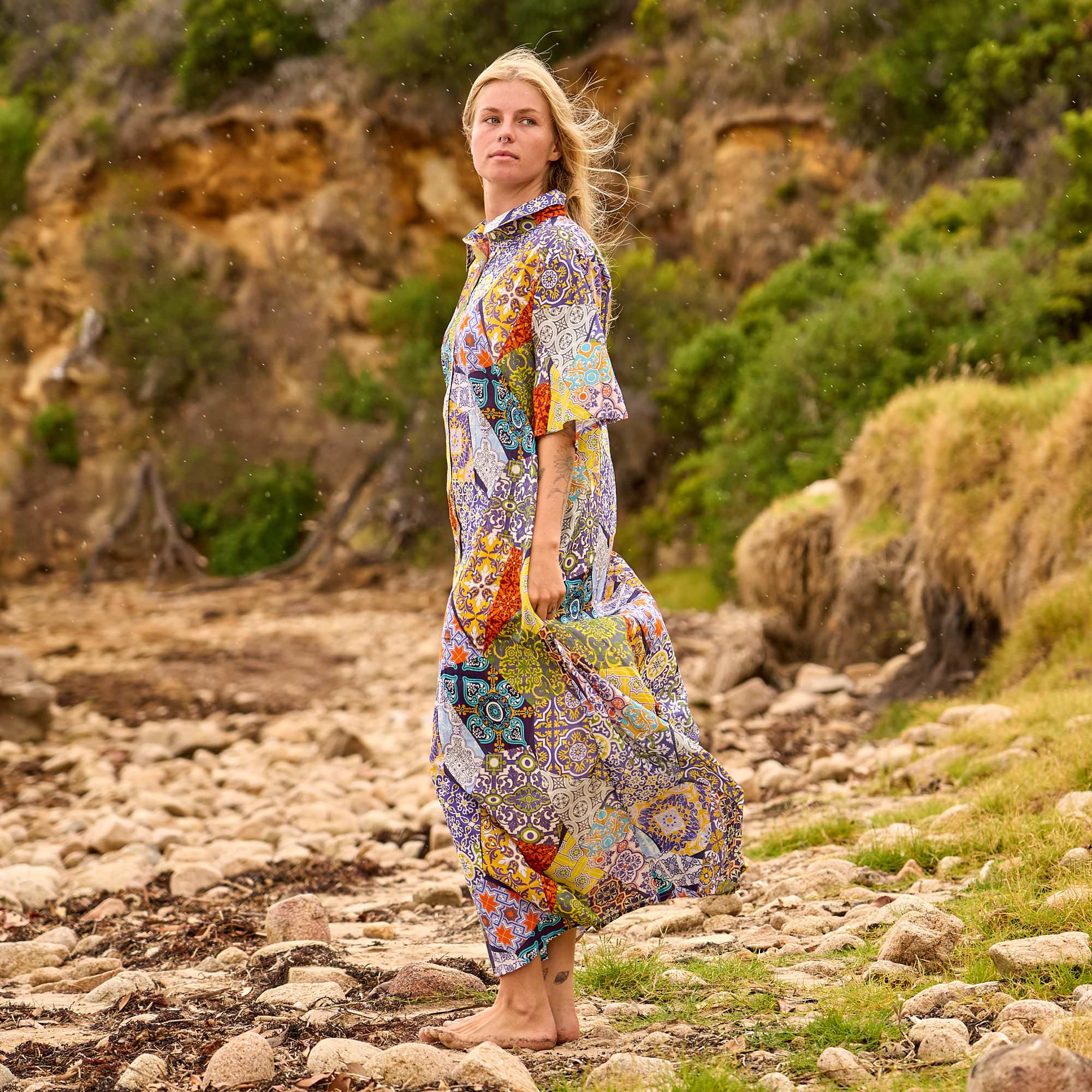 Women's boho maxi dress featuring colorful tile print patterns and a comfortable flowy silhouette.