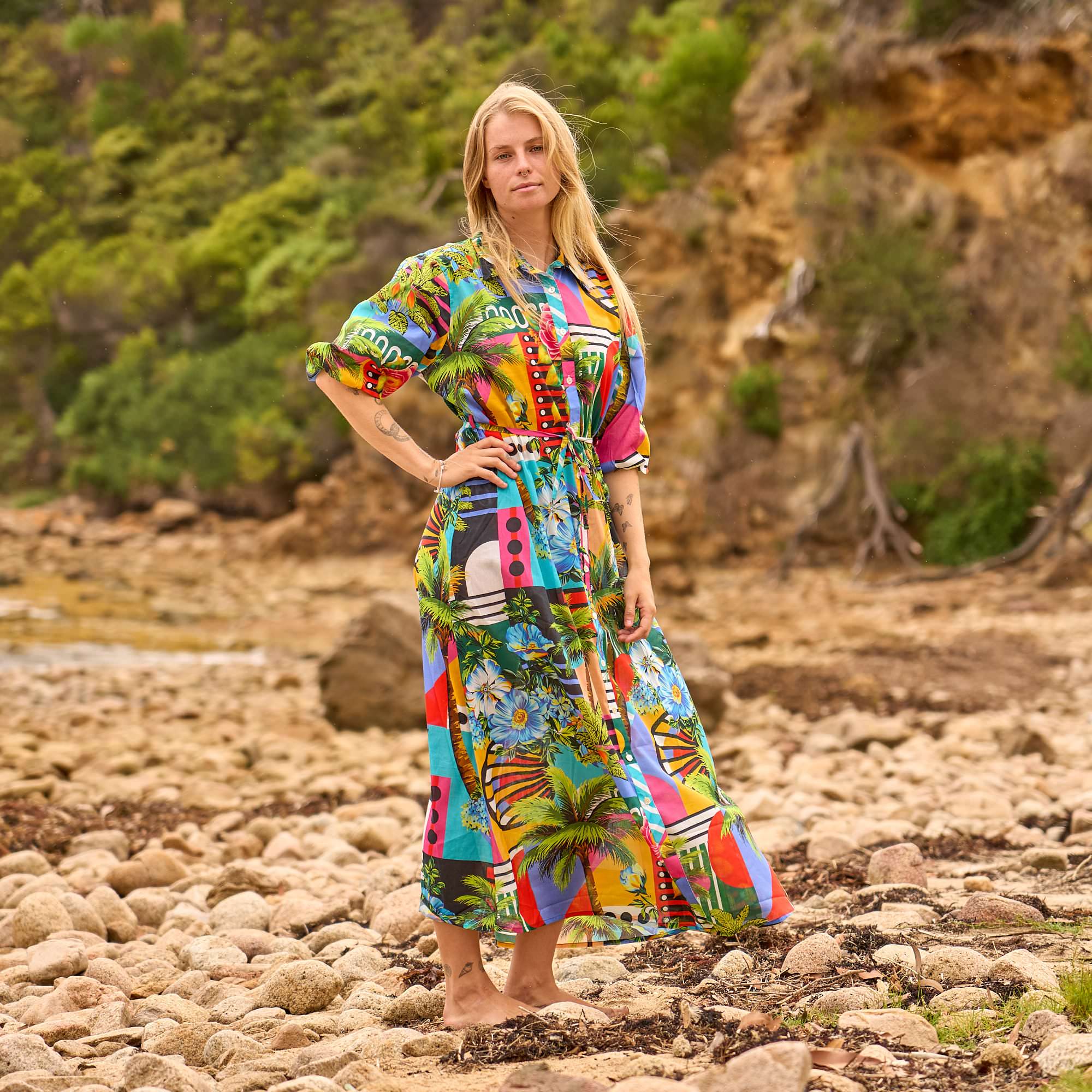 Bold tropical print maxi dress with a relaxed silhouette, perfect for beach cover up and vacation wear.