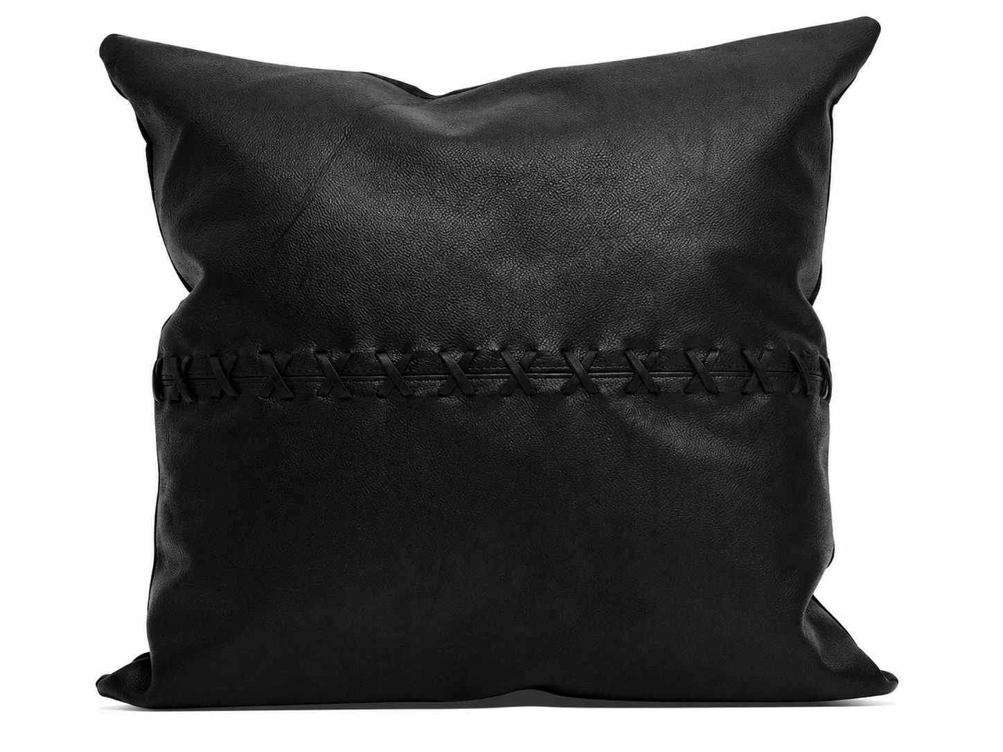 100% tan leather cushion cover with black cross design for boho and rustic home decor.
