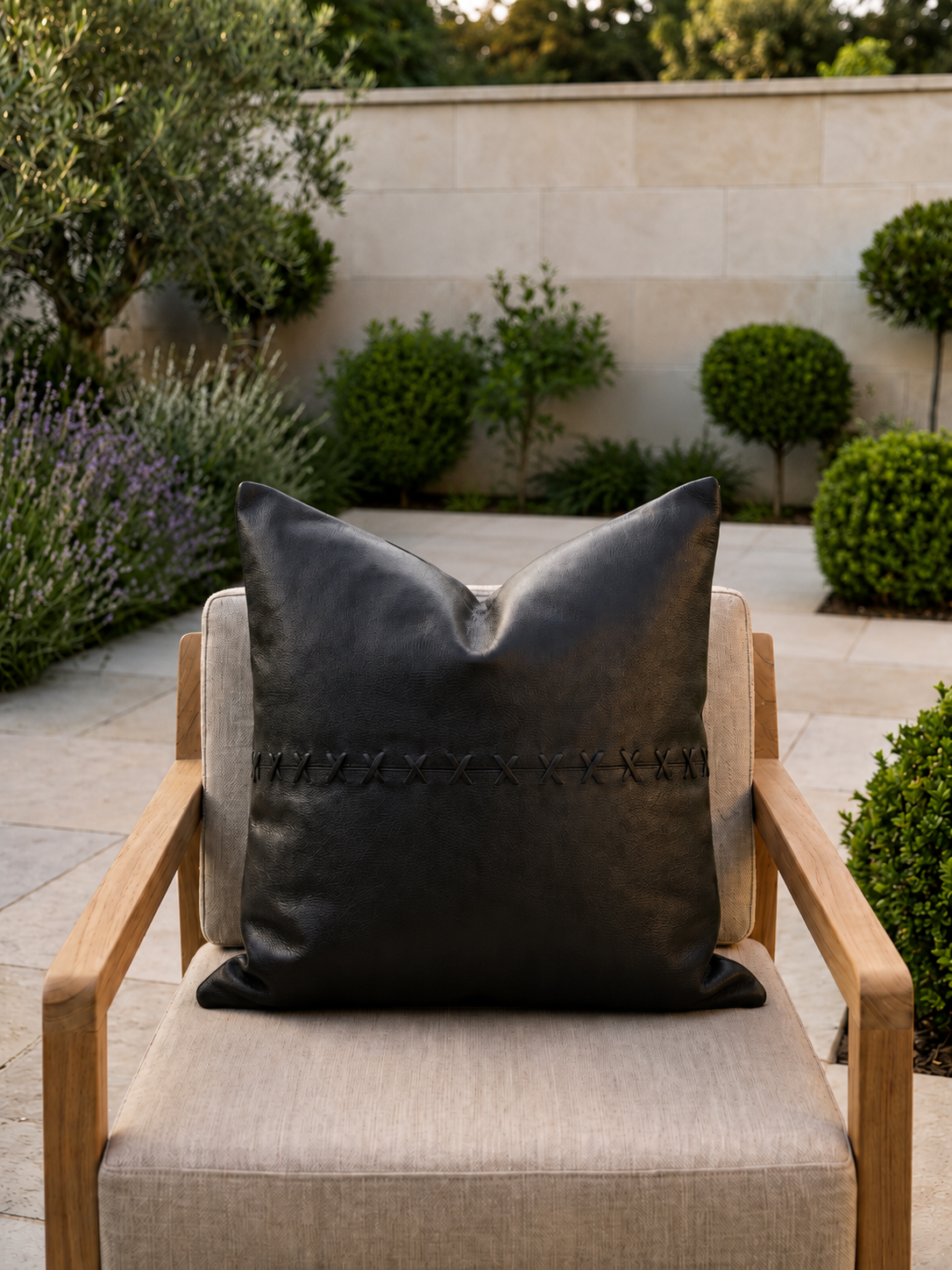 Boho tan leather cushion cover with unique black cross pattern, ideal for sofas, chairs, and decor accents.