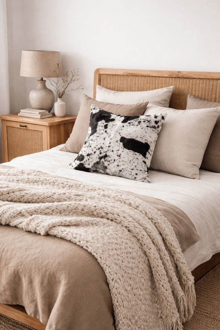 Boho-eclectica black and white cowhide pillow cover with natural leather texture