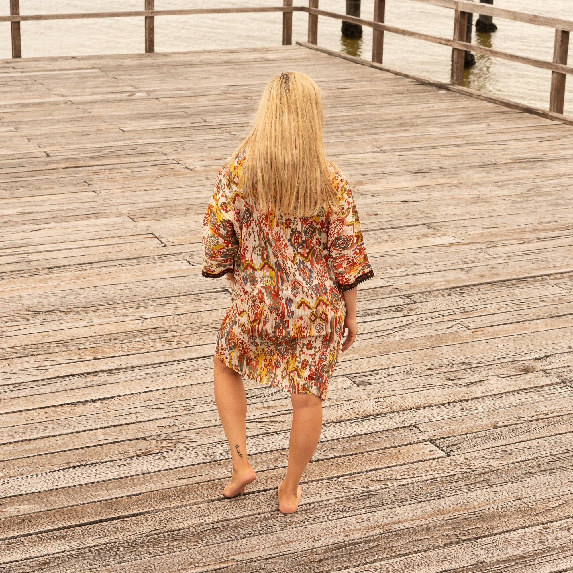 Close-up detail of handcrafted ikat pattern on cotton shirt dress