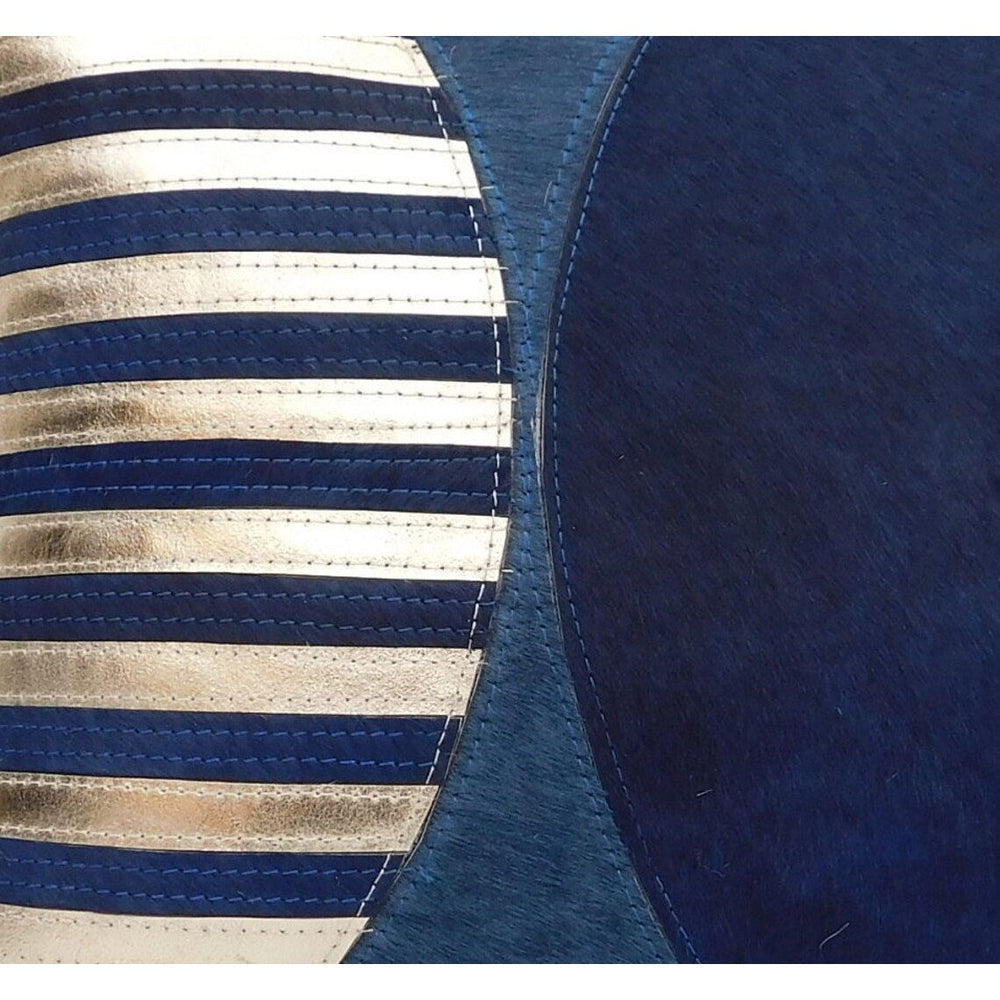 Boho navy and silver striped cowhide cushion cover with a curved panel design.