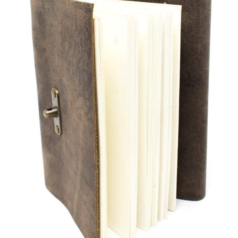 Vintage brown genuine leather journal with a brass clasp and thick, recycled paper pages.